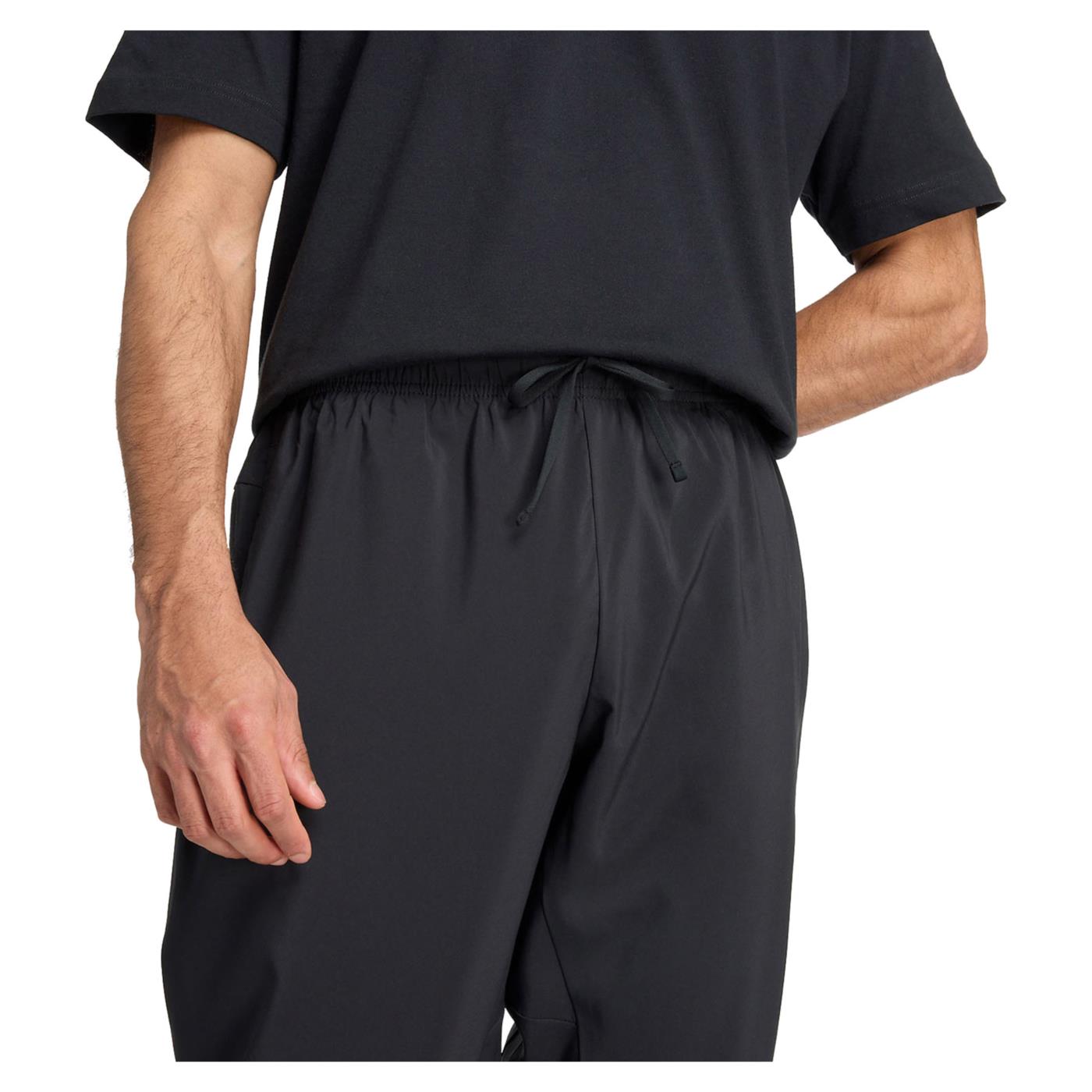 NEW BALANCE ESSENTIALS WOVEN JOGGER